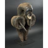 FANG BELLOWS, of figurative form, carved and painted wood, on stand, 60cm H overall.