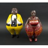 CARICATURE FIGURE CARVINGS, West African, of a husband and wife, painted wood, 33cm H x 32cm W.