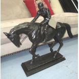 BRONZE STATUE, of jockey on a horse, 71cm L.