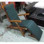 SUN LOUNGERS, a pair, foldable slatted teak construction,