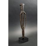 FLUTE, West African, carved wood in figurative form, 32cm H plus display stand.