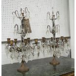 CANDELABRUMS, a pair, six branch, in metal with glass drops, 59cm H.