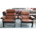 ARMCHAIRS, a companion pair, Danish ebonised upholstered in tan leather, 88cm W.