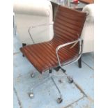 REVOLVING DESK CHAIR, Charles Eames design, nut brown ribbed leather,