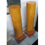 PEDESTAL COLUMNS, a pair, Doric style, in a faux marble affect of yellow ochre tone,