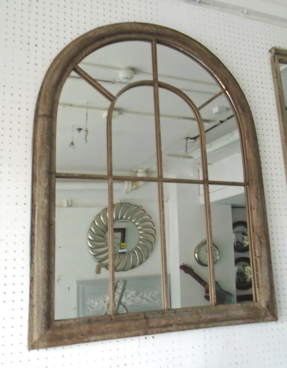 GARDEN MIRRORS, a pair, with an arched top in a rustic style finish, 88cm x 69cm.