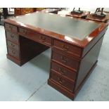 PEDESTAL DESK, mahogany with a rectangular green lined top and seven drawers below,