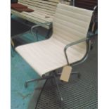 REVOLVING ARMCHAIR, white ribbed leather, on aluminium frame, by Herman Miller (stamped).