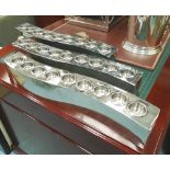 TEA-LIGHT HOLDERS, a set of three, in chromed metal finish, 55cm L.