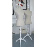 MANNEQUINS, a pair, on white painted wooden triform support, 142cm H.