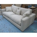 SOFA, two seater, in neutral fabric on block supports with four scatter cushions, 220cm L.