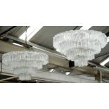 MURANO TRONCHI CHANDELIERS, a pair, 1960's textured clear glass, 80cm diam x 45cm.