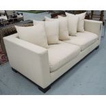 ANDREW MARTIN SOFA, two seater, in neutral fabric on block supports with five cushions, 202cm L.