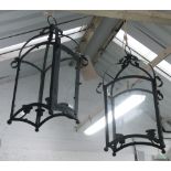 ROOKS TABLE LIGHTS, a set of four, in a black finish with foliate decoration, 60cm H.