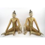 THAI DANCER FIGURES, a companion pair, in seated pose, carved and painted wood, both 56cm H.