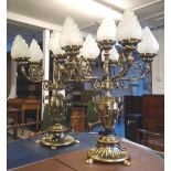 CANDELABRA, a pair, decorative brass with five lights and 'flame' glass shades, 86cm H.