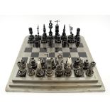 CHESS SET, the pieces made from vehicle and machine parts,