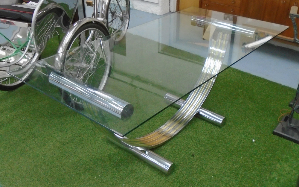 DINING TABLE, 1970's Italian rectangular glass and gilt chrome arched support,