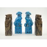 ORIENTAL SOAPSTONE SEALS, a pair, 17.5cm H; and a pair of ceramic foo dogs on plinths, 20.5cm H.