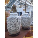 TABLE LAMPS, a pair, blanc de Chine pierced porcelain, each 61cm H.