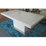 DINING TABLE, with rectangular extending white lacquered top on a square metal base,