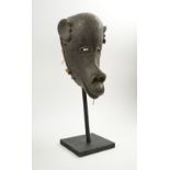 TRIBAL FACE MASK, Bamana people, 32cm H, with display stand.