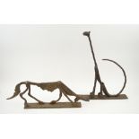 MODERNIST TRIBAL SCULPTURES, Mali, wrought bronze, dog 61cm L and cat 52cm H.