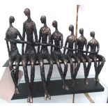 SCULPTURE, people on bench Giacometti style in coppered resin, 39cm L.