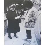 HENDRIX SIGNS A PARKING TICKET FOR A TRAFFIC WARDEN, London 1967, photographic print, 60cm x 39cm,