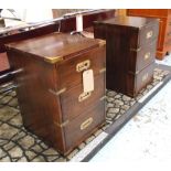 BEDSIDE CHESTS, a pair, Campaign style mahogany and brass bound each with three short drawers,