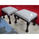 STOOLS, a pair, with plain linen covered seat, on claw feet.