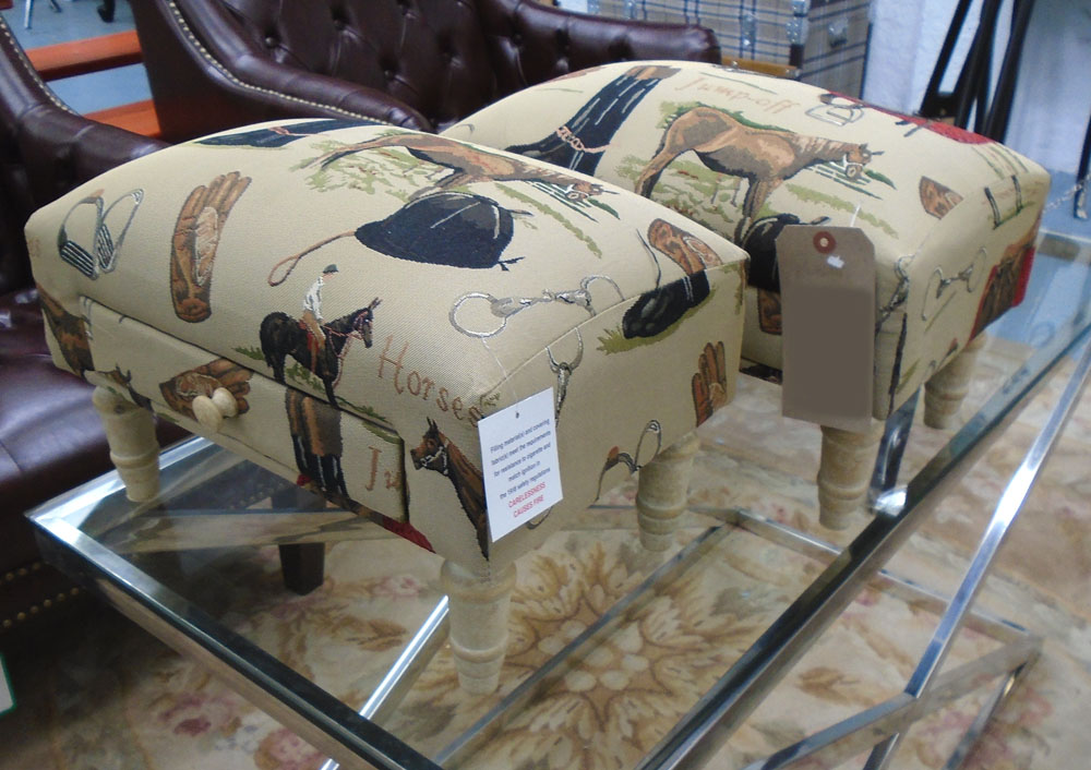 FOOTSTOOLS, a pair, equestrian design upholstery, with drawers, on turned wooden supports,