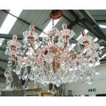 CHANDELIER, twelve branch, in coppered finish with crystal drops, 44cm H plus chain.