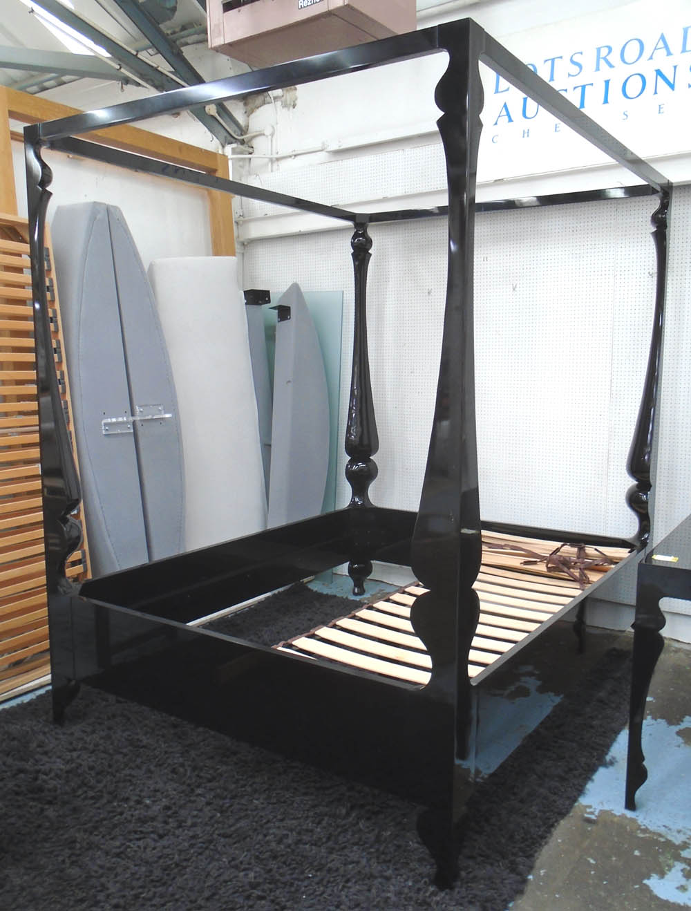 FOUR POSTER BEDFRAME, Louis by John Reeves in black lacquered finish, 168cm x 220cm H x 210cm L.