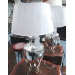 TABLE LAMPS, a pair, in chromed finished with shades, 73cm H.