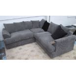 CORNER SOFA, in a grey corded fabric with scatter cushions of various descriptions.