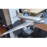 MODEL DAKOTA DC-3 AIRCRAFT, on stand, 99cm x 65cm x 38cm H.