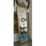 MIRROR, with bevelled plate, Louis XV style in a gilded frame, 216cm x 63cm.