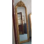 MIRROR, with bevelled plate, Louis XV style in a gilded frame, 216cm x 63cm.