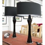 TABLE LAMPS, a pair, in black with shades by Heathfield.