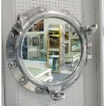 MIRROR OF SHIPS HATCH FORM, polished aluminium metal surrounds with catches, wall fixings attached,