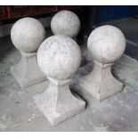 GARDEN RECONSTITUTED STONE BALL FINIALS, four, 23cm W x 46cm H.