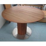 DINING TABLE, circular walnut, extendable with one unextended leaf 121cm W, leaf 150cm W.