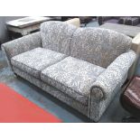 SOFA, two seater, grey fabric with floral relief, on turned castors support, 184cm L.