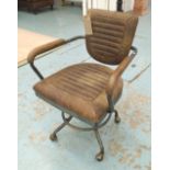 DESK CHAIR, on castors, in tanned leather, 57cm W.
