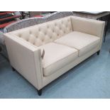 SOFA, two seater, cream leather button back, on ebonised frame square supports, 166cm L.