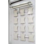 COAT RACK, 1970's white melamine suspended plaques and shelf, 74cm W x 109cm H.