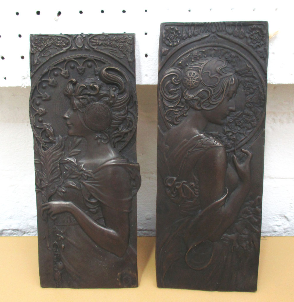 BRONZE PLAQUES, a pair, Art Nouveau style, 23cm x 9cm.