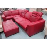 RED LEATHER CORNER SOFA, by Natuzzi, with sofa bed section and footstool, 185cm x 315cm.