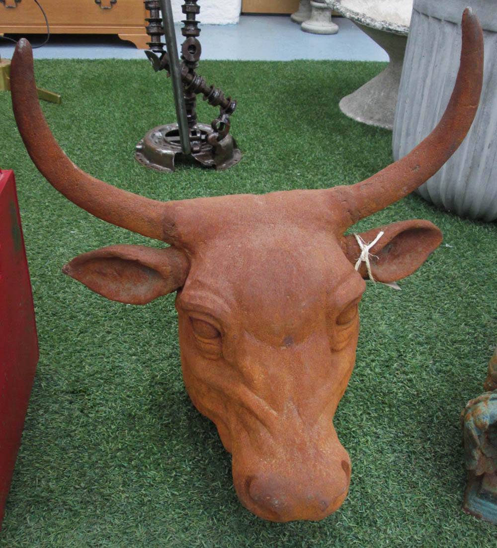 WALL ORNAMENT, in the form of a bulls head, in an oxidised metal finish, 58cm H.